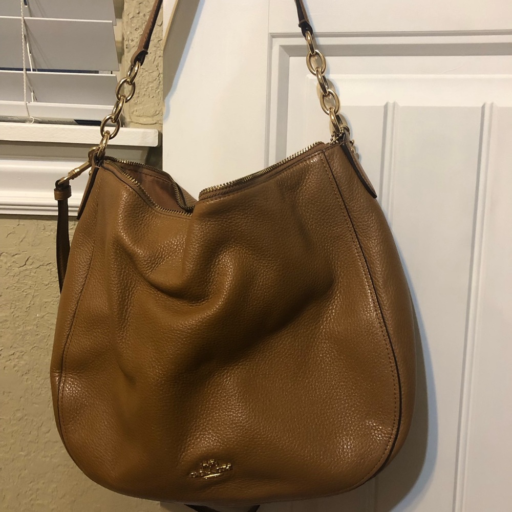 Tan Coach bag with crossbody strap and over the shoulder strap